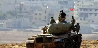 Turkish-Army-tank-looking-at-Kurdish-village-324x160.jpg